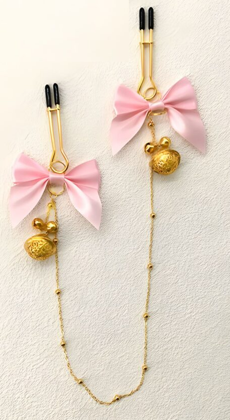 Pink bow and gold-tone bell chain accessory